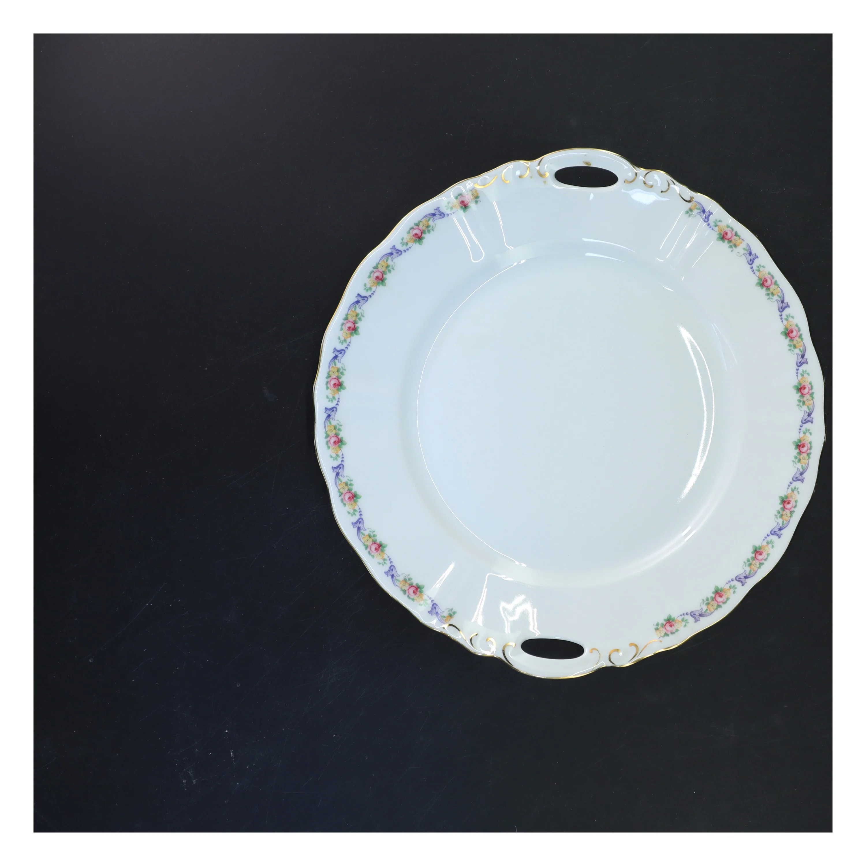 Rund porcelænsfad med blomstermønster (str. Ø 27 cm)