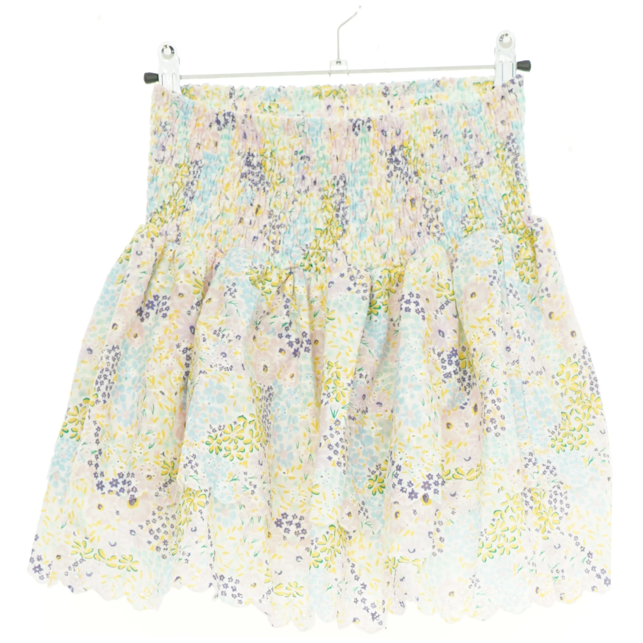 Nederdel str. 140 cm. Uanvendt 