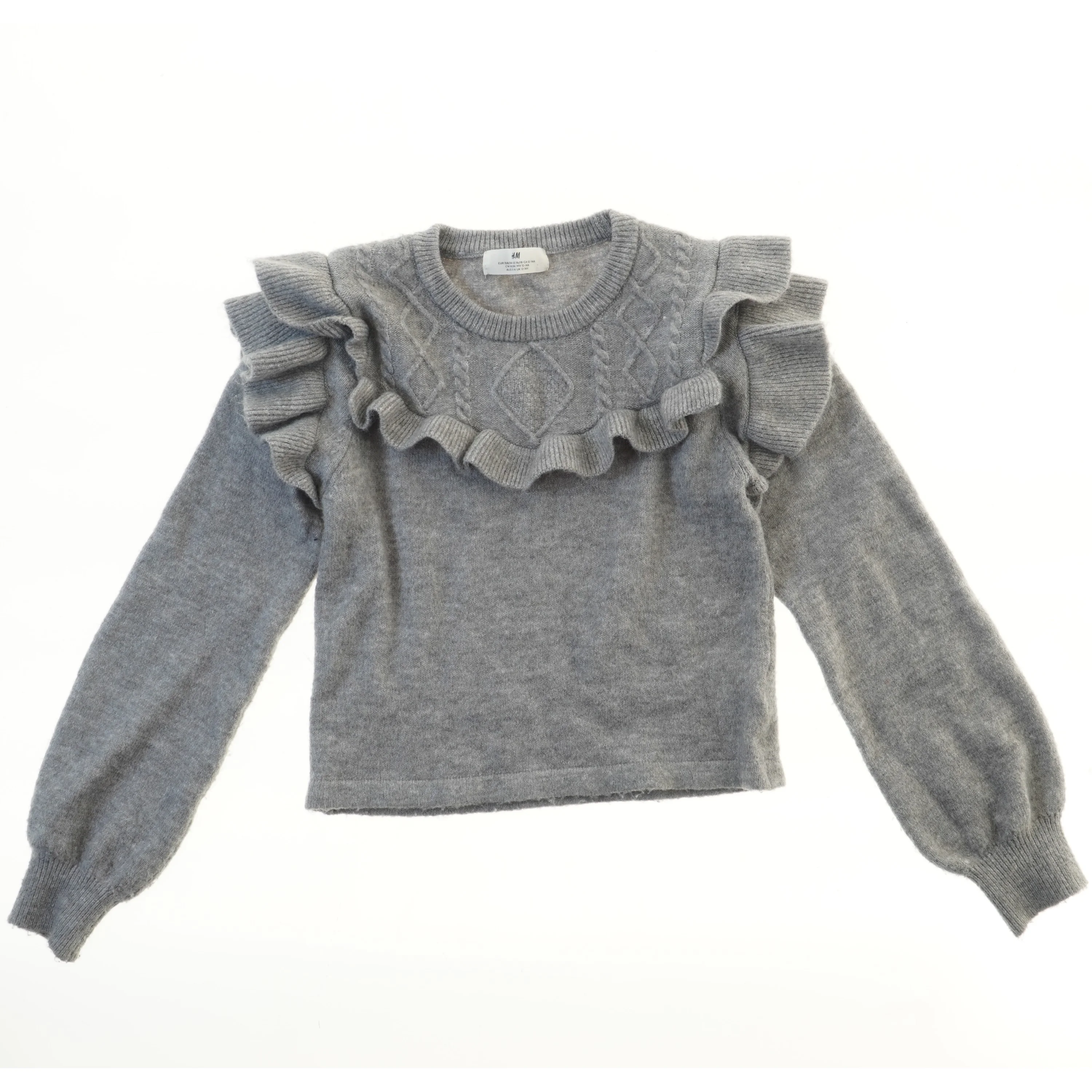 Striktrøje med flæsedetaljer fra H&M (str. 164)