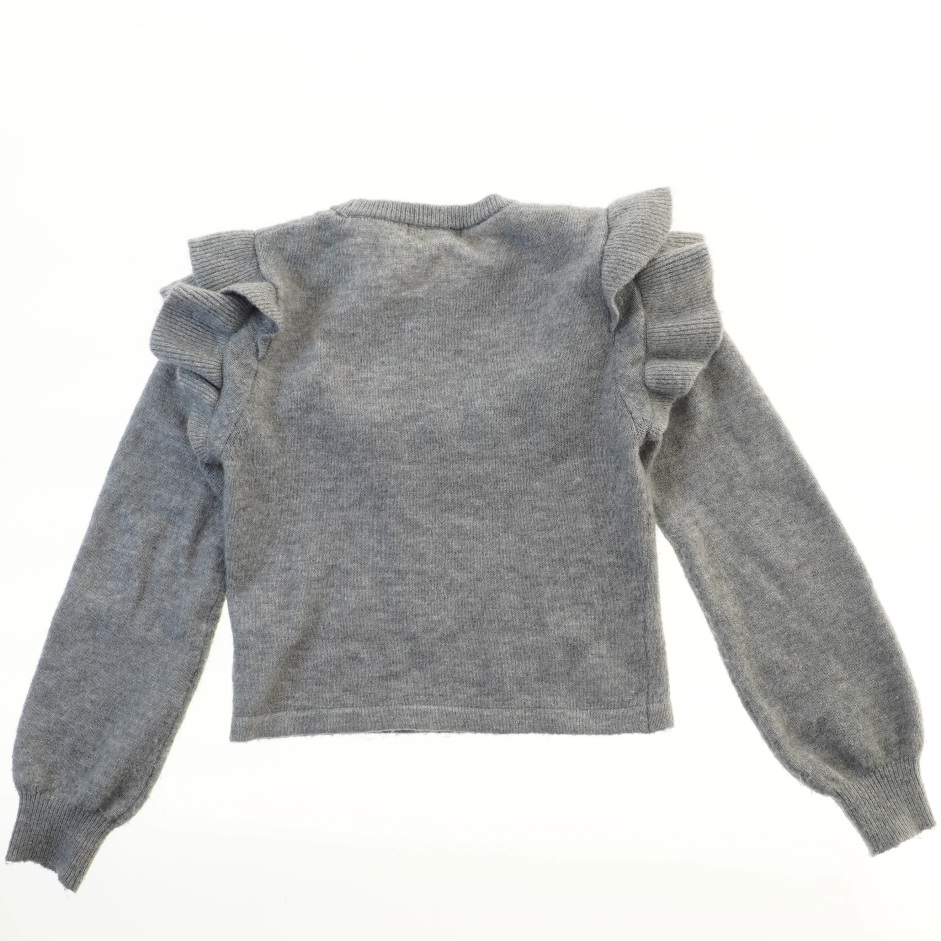 Striktrøje med flæsedetaljer fra H&M (str. 164)