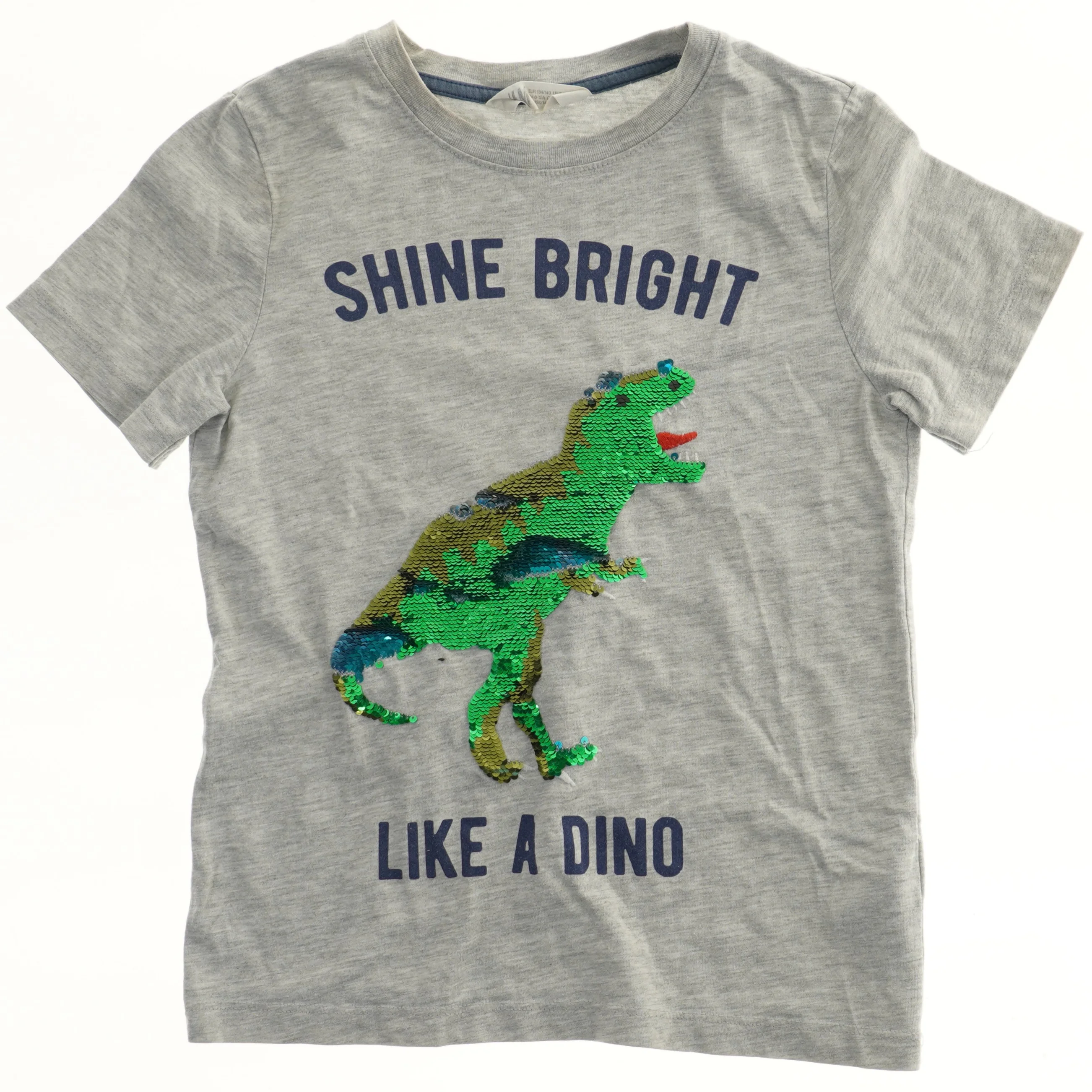 T-shirt med dinosaur palietter fra H&M (str. 140)