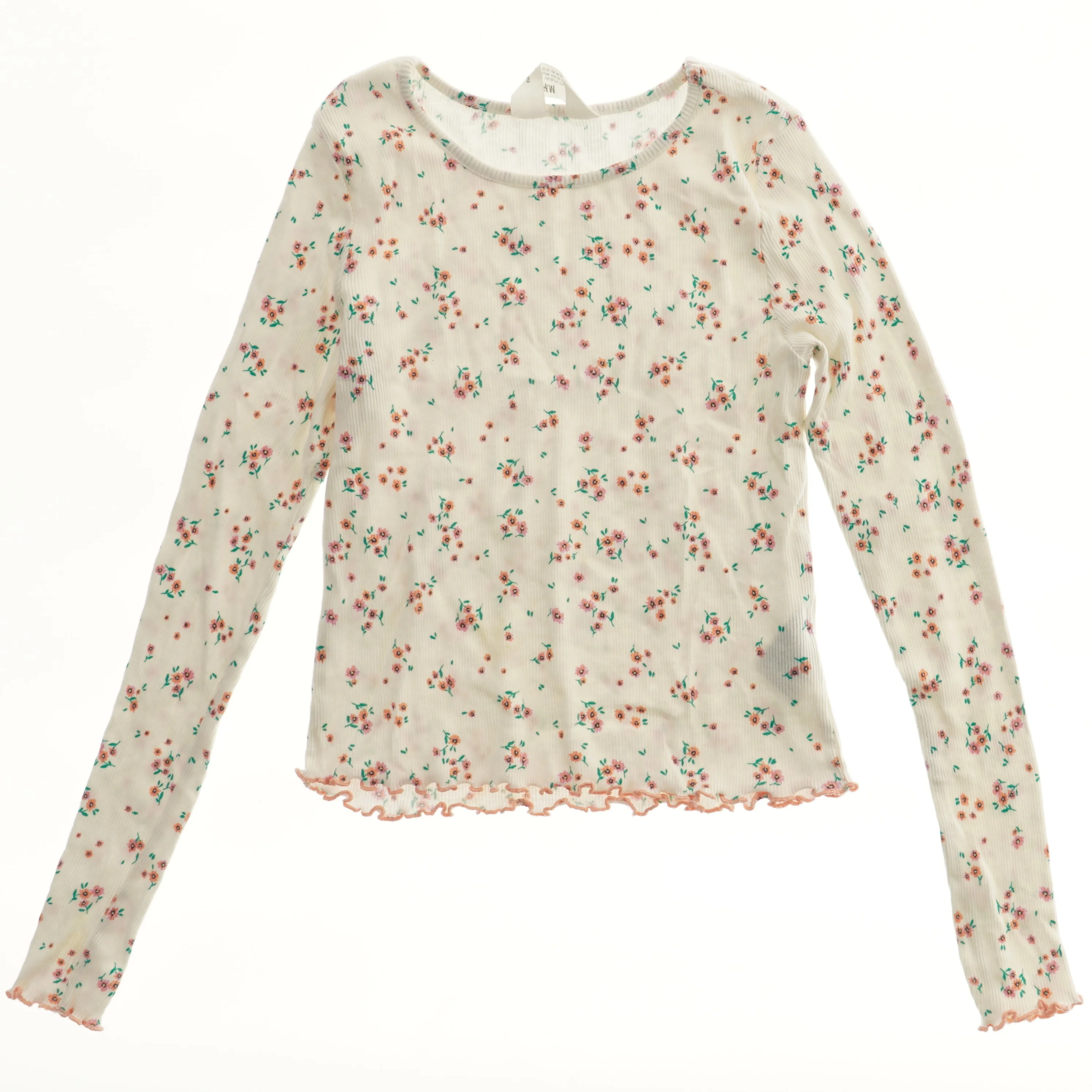 Bluse med blomsterprint fra H&M (str. 152)