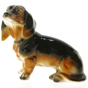 Porcelæns figur af gravhund (str. 16 x 8 cm)