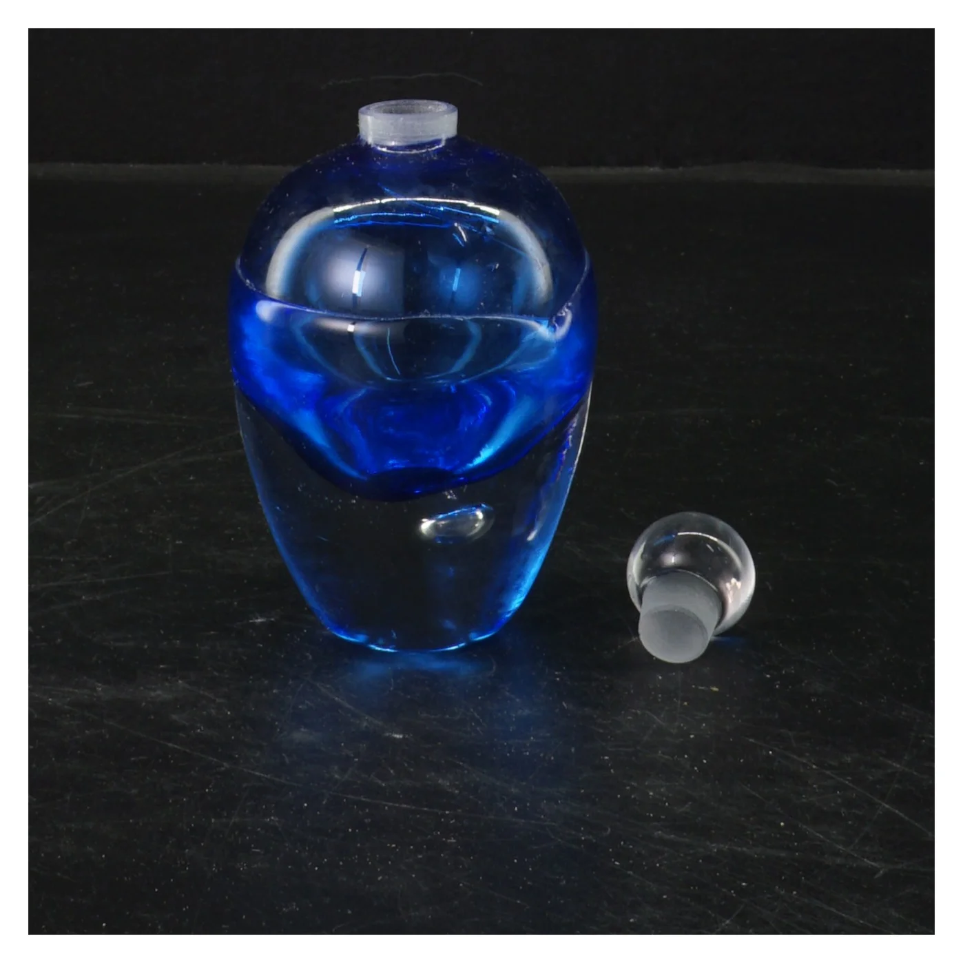 Blå glasflaske med prop (str. 11x6 cm)