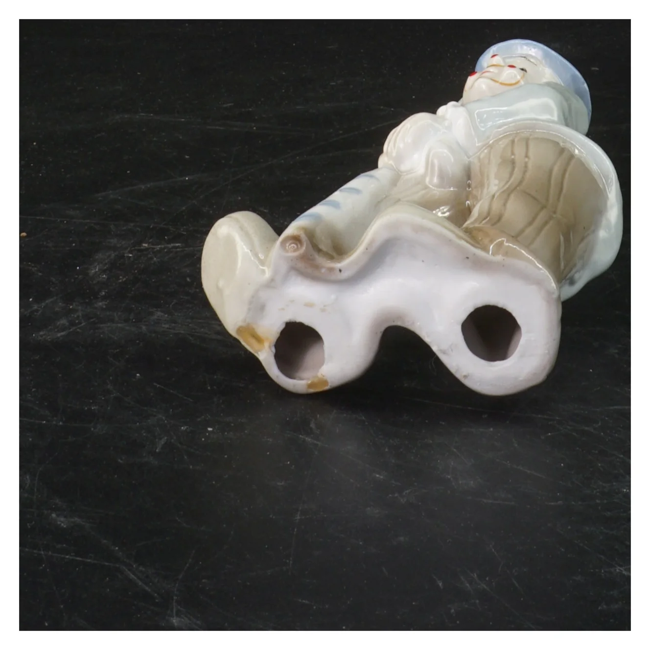 Porcelænsfigur af mand (str. 17x8,5 cm)
