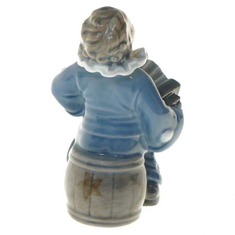 Porcelænsfigur af klovn med harmonika fra Royal Copenhagen (str. 11x5 cm)