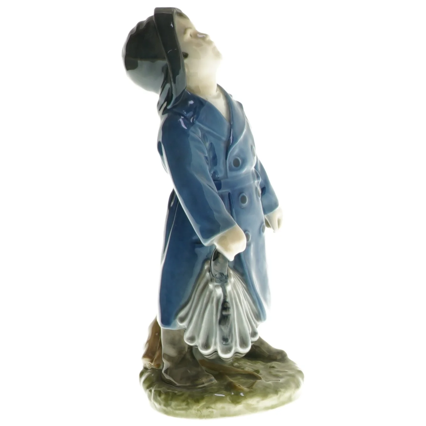 Porcelænsfigur med frakke og paraply fra Royal Copenhagen (str. 18,5 cm)