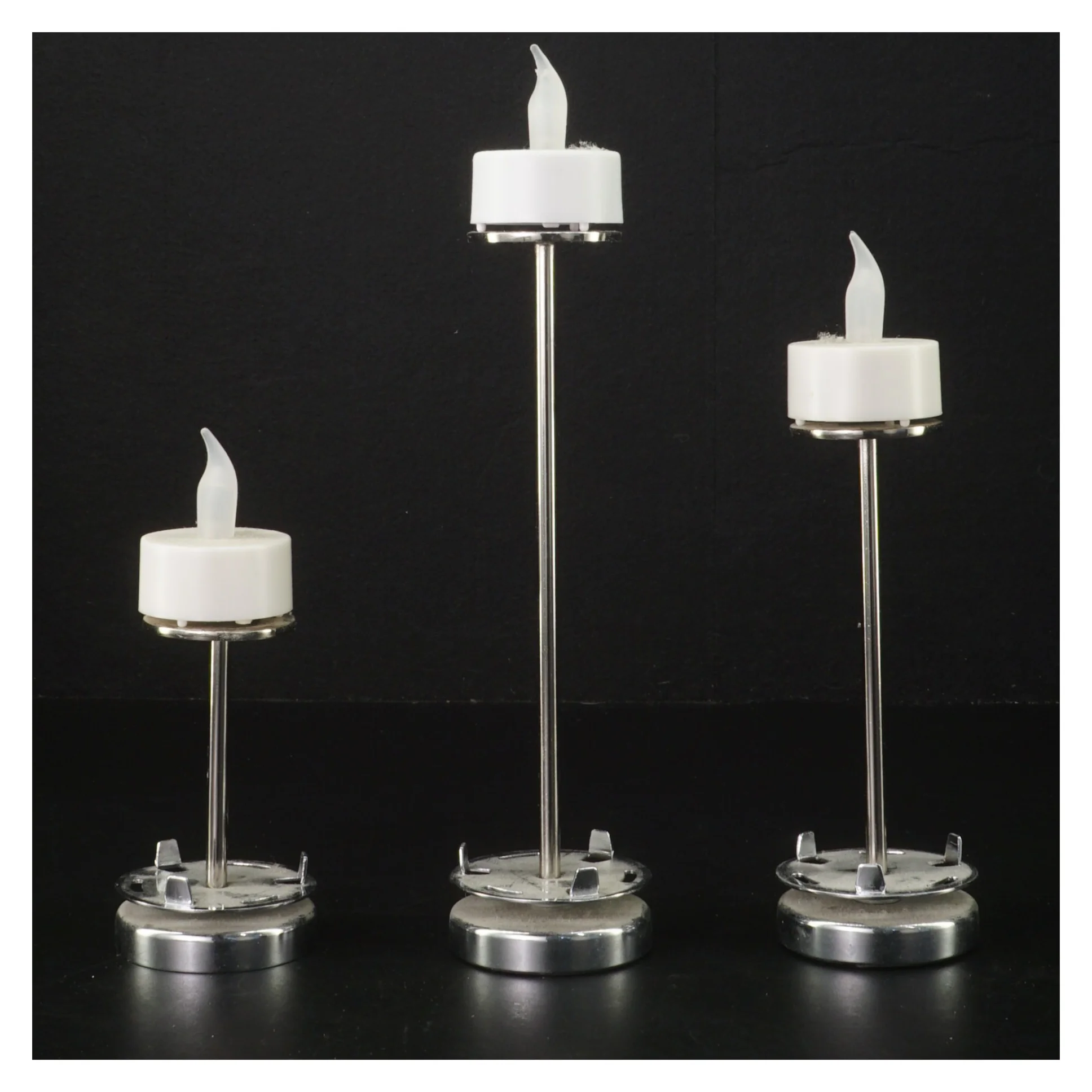 Sæt af elektroniske lysestager fra Herstal (str. 13-23 cm)