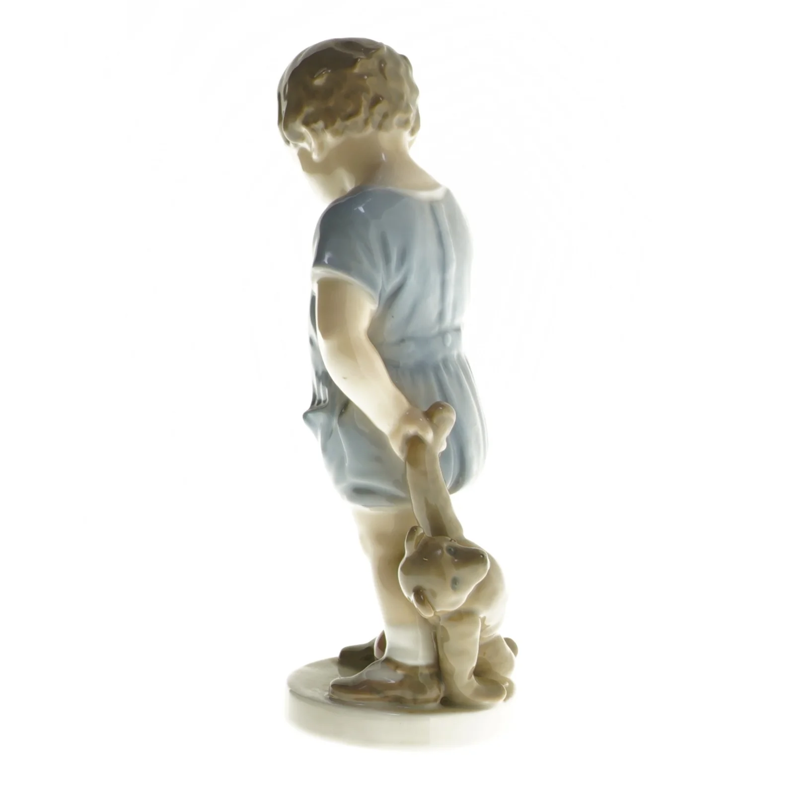 Porcelænsfigur af barn med bamse fra Royal Copenhagen (str. 19 cm)