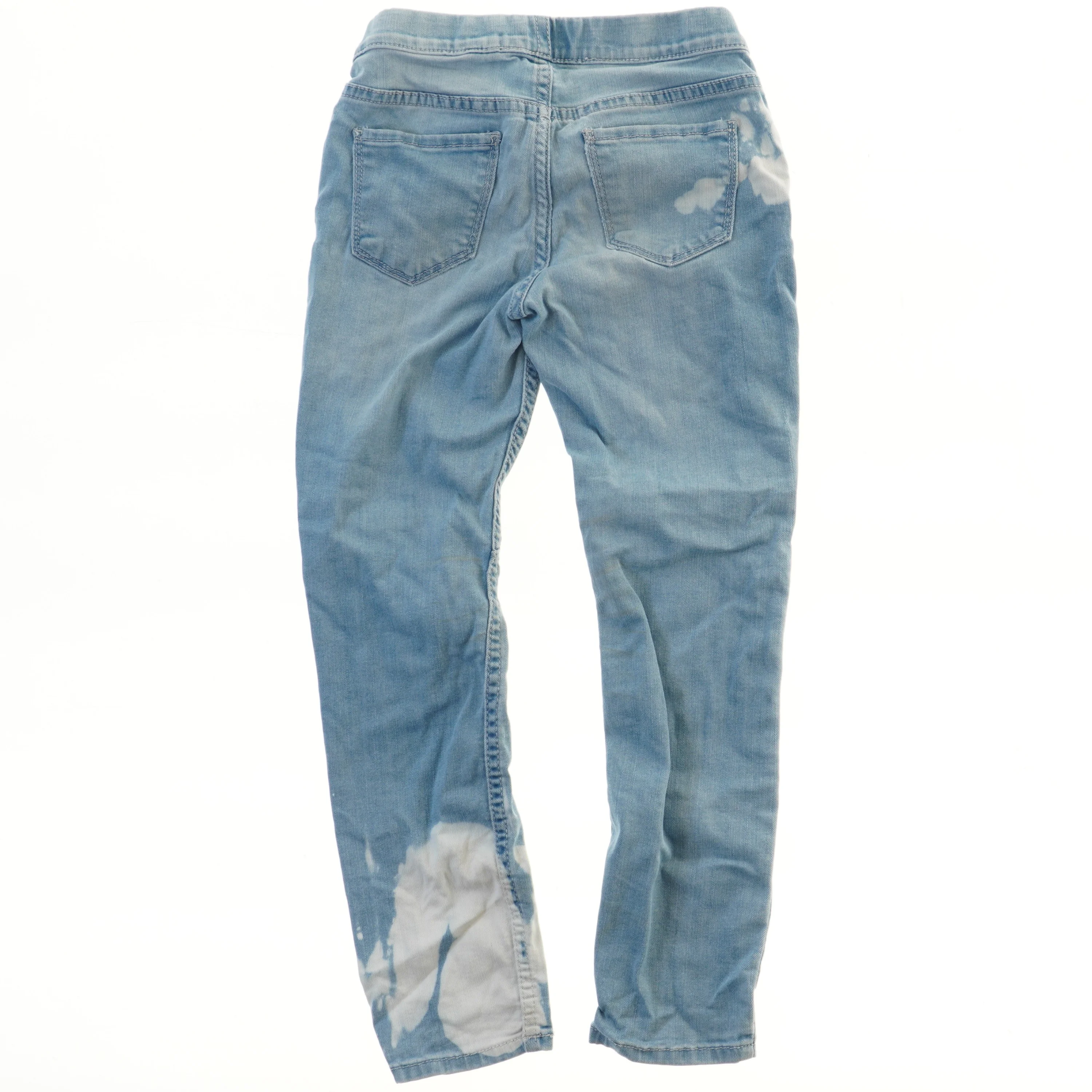 Børnejeans med katteprint og sløjfer fra H&M (str. 122)