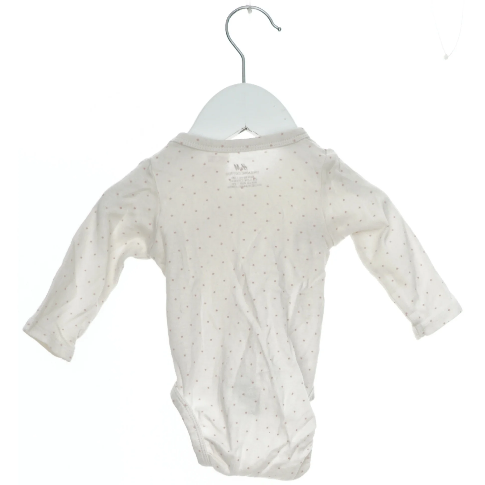 Langærmet bodystocking med prikker fra H&M (str. 56)