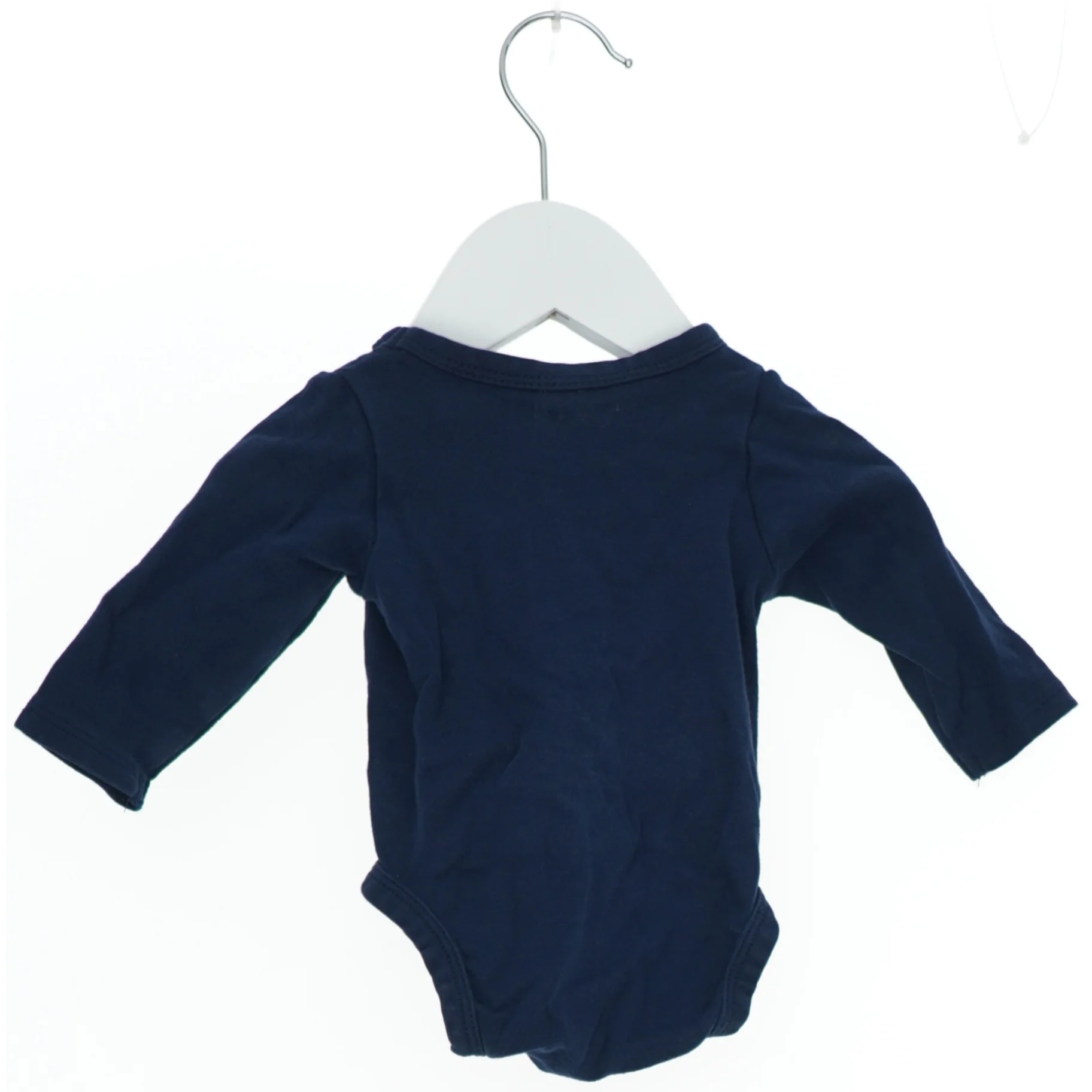 Langærmet bodystocking til baby fra H&M (str. 56)