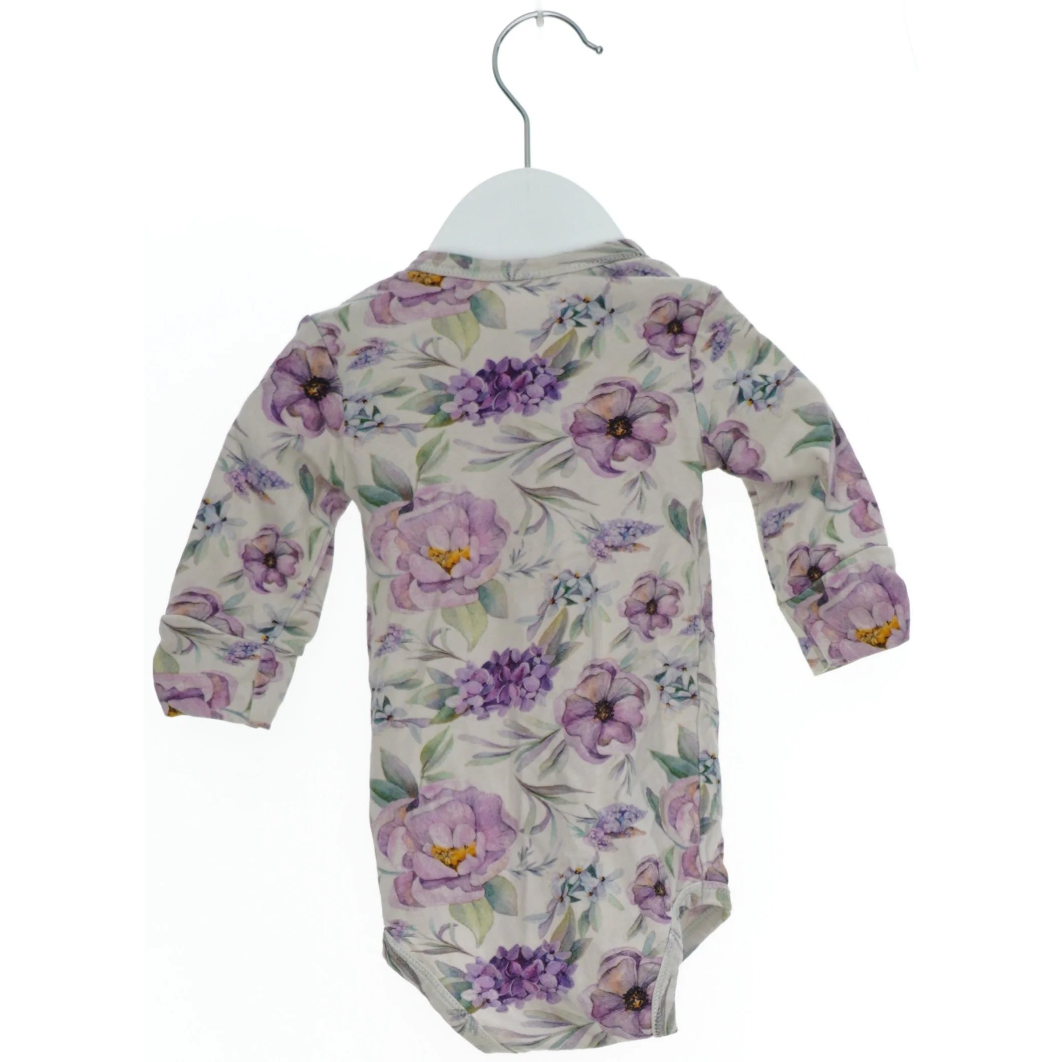 Blomstret bodystocking til baby fra Müsli (str. 62)