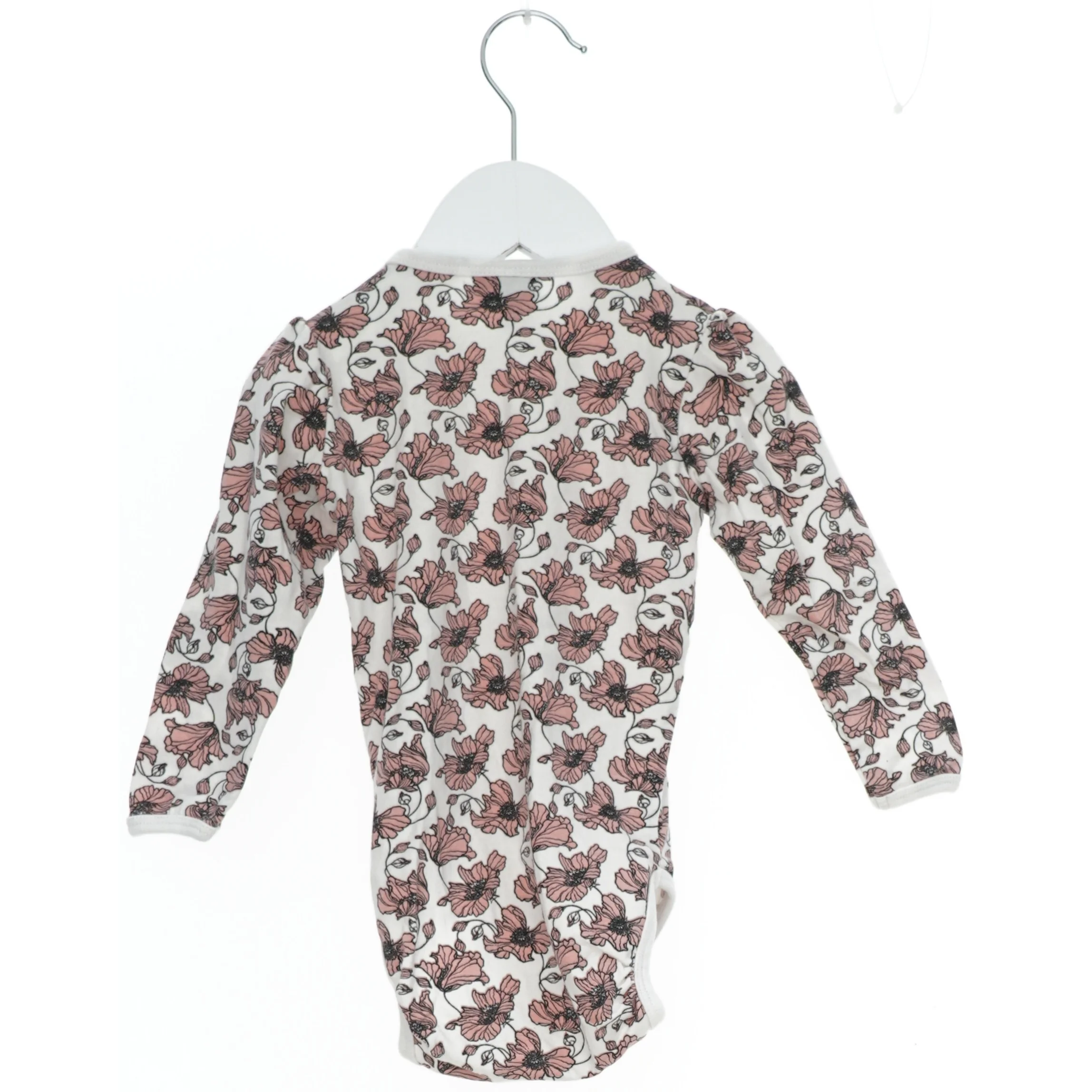 Blomstret bodystocking til børn fra Kids Up (str. 74)