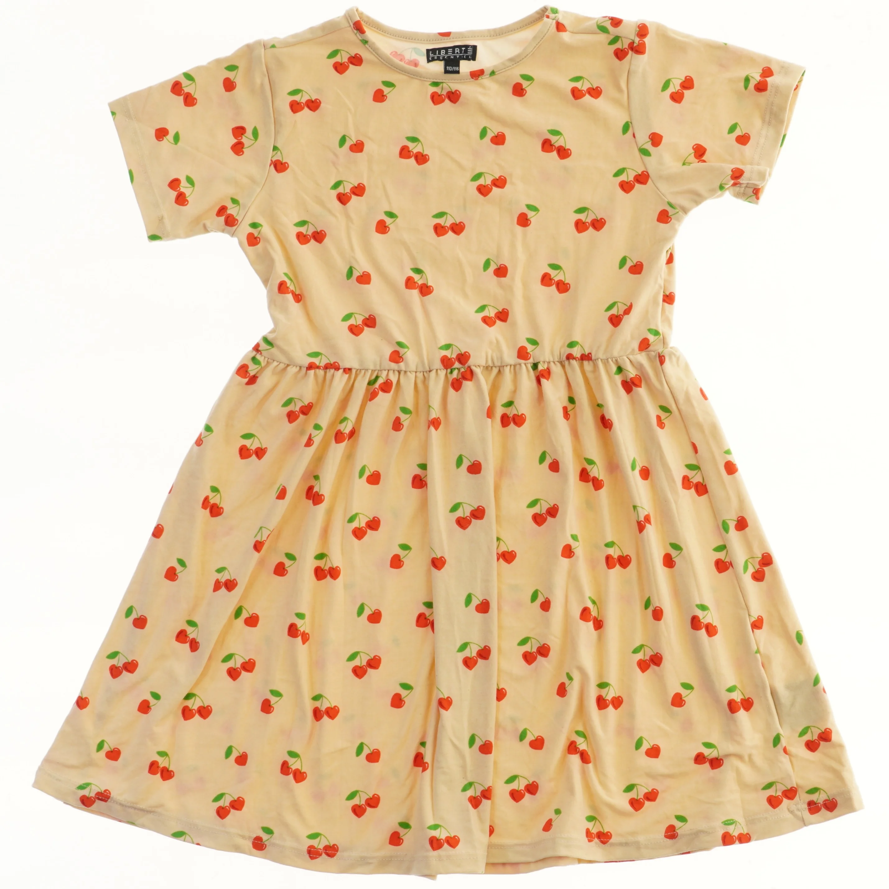 Børnekjole med kirsebærmønster fra LIBERTÉ Essentiel (str. 110)