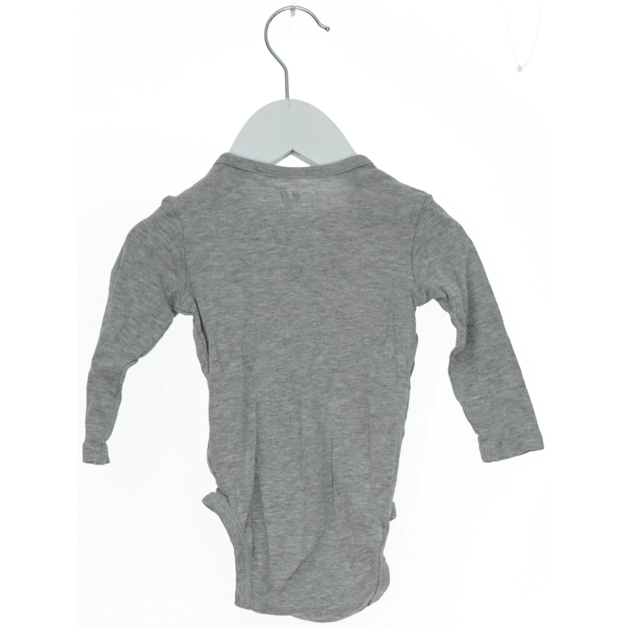 Grå bodystocking med lange ærmer fra H&M (str. 68)