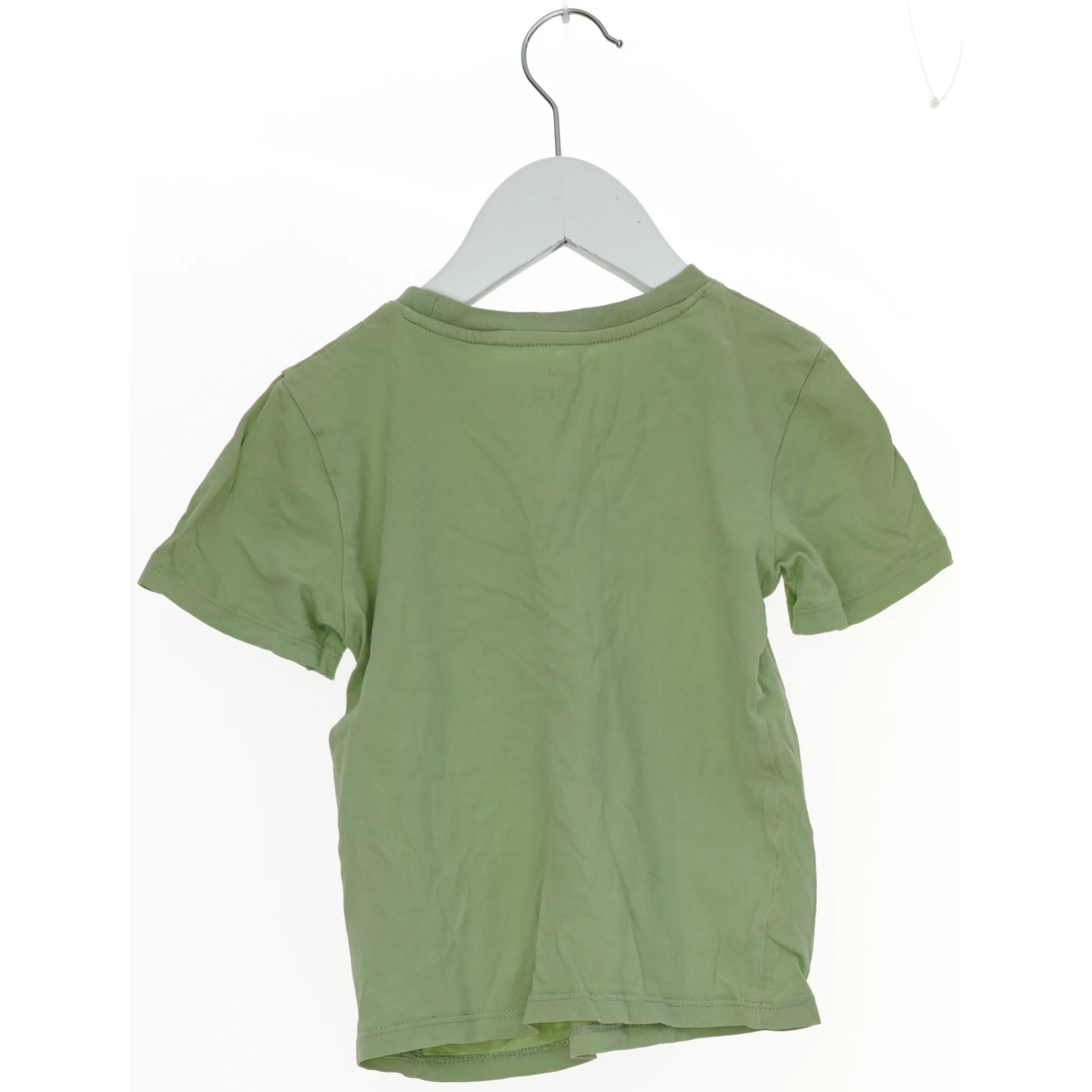 Grøn T-shirt med dinosaur print fra H&M (str. 98)