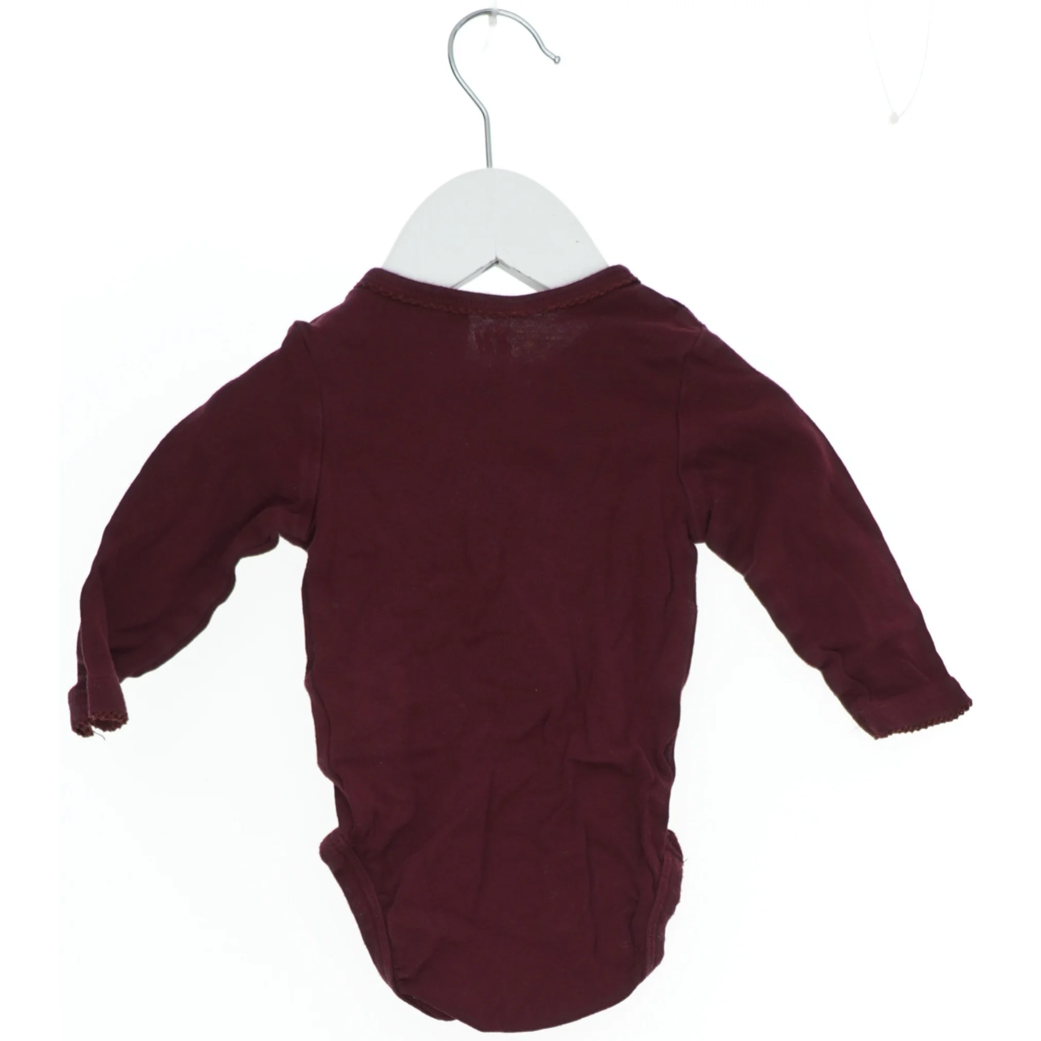 Langærmet bodystocking til baby fra H&M (str. 62)