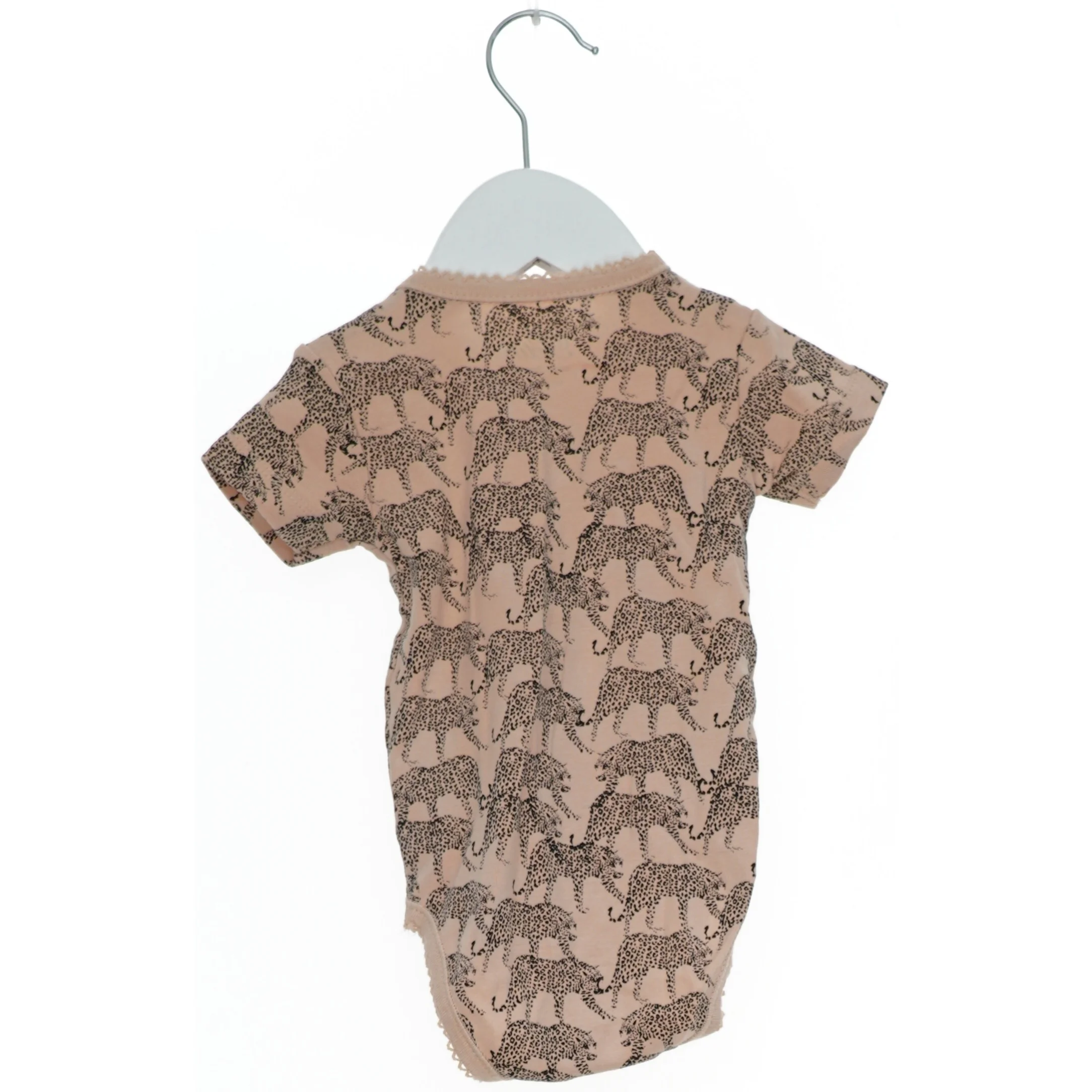 Kortærmet bodystocking med leopardmønster fra Petit (str. 74)