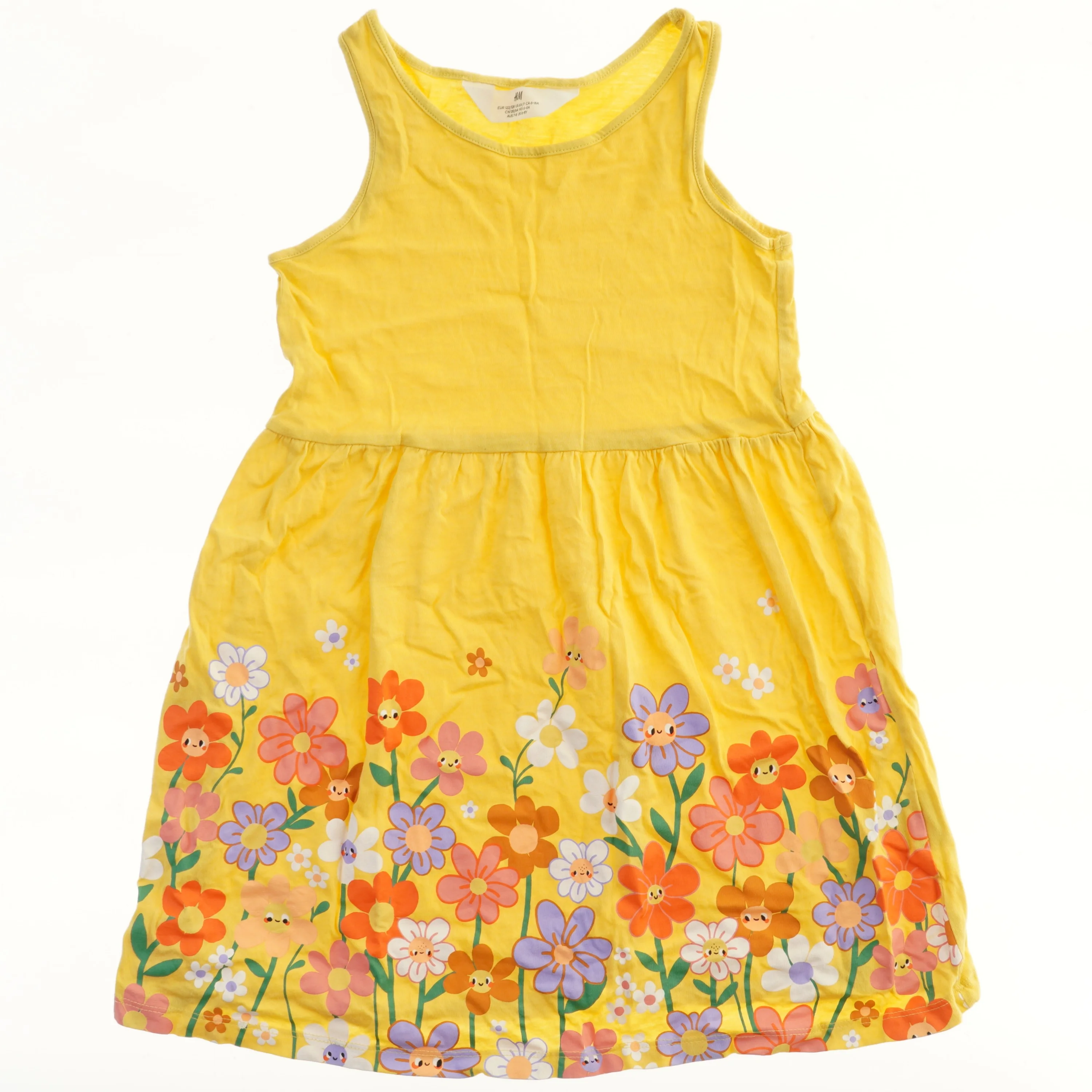 Børnekjole med blomsterprint fra H&M (str. 122)