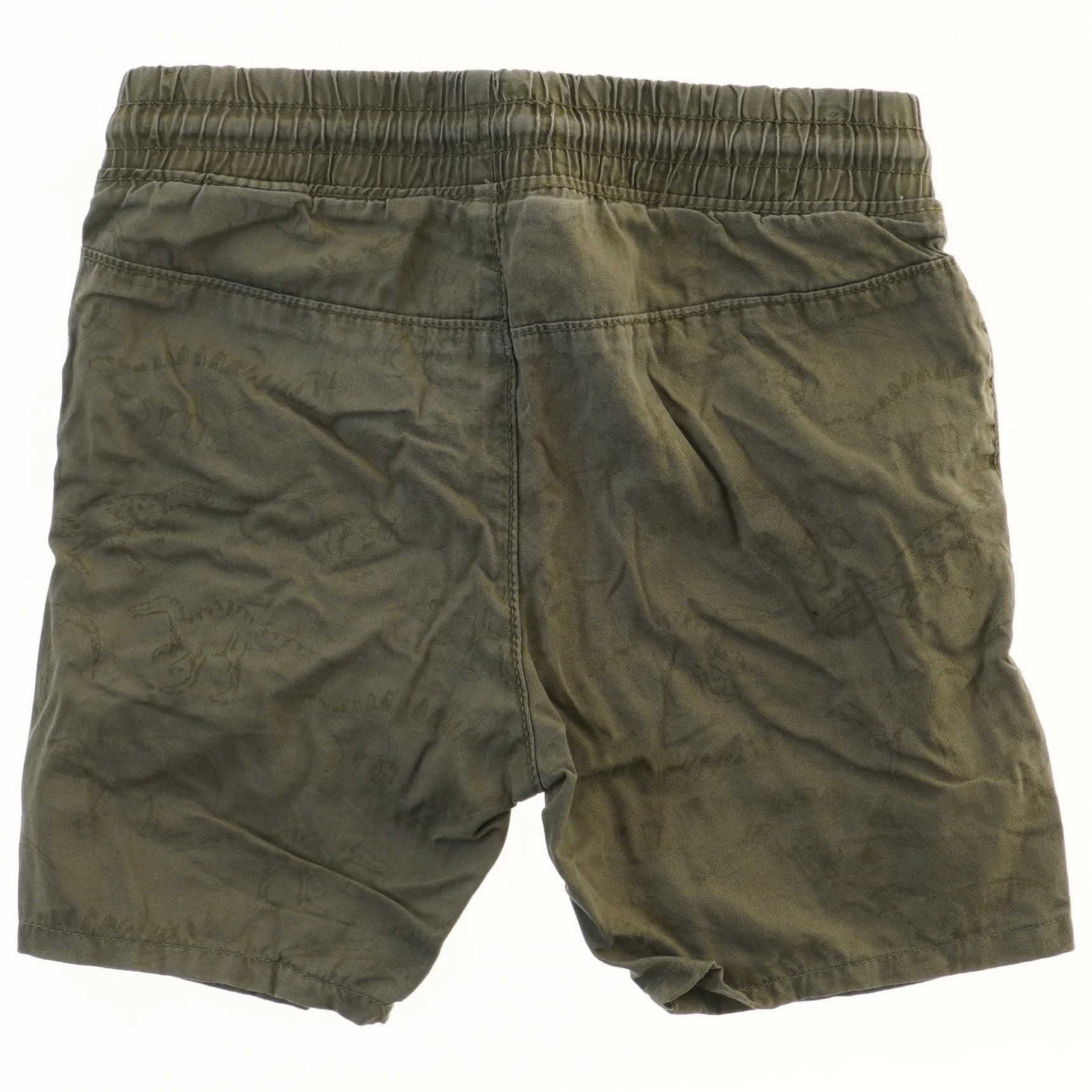 Grønne shorts med dinosaurmønster fra H&M (str. 104)