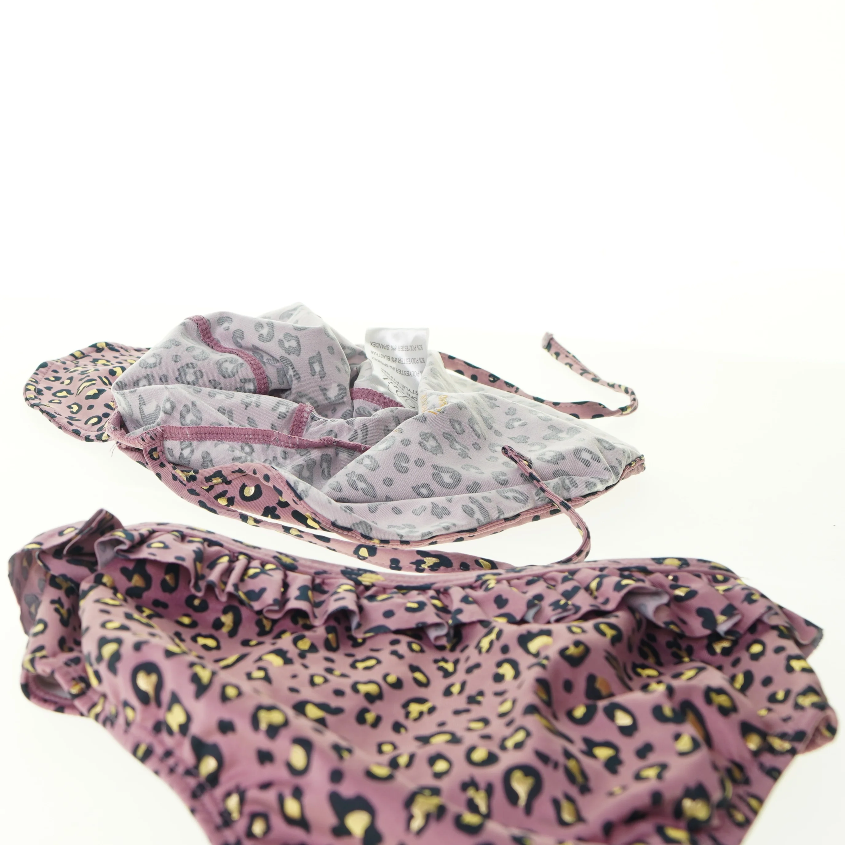 Badebukser og badehætte til baby fra Petit (str. 98)