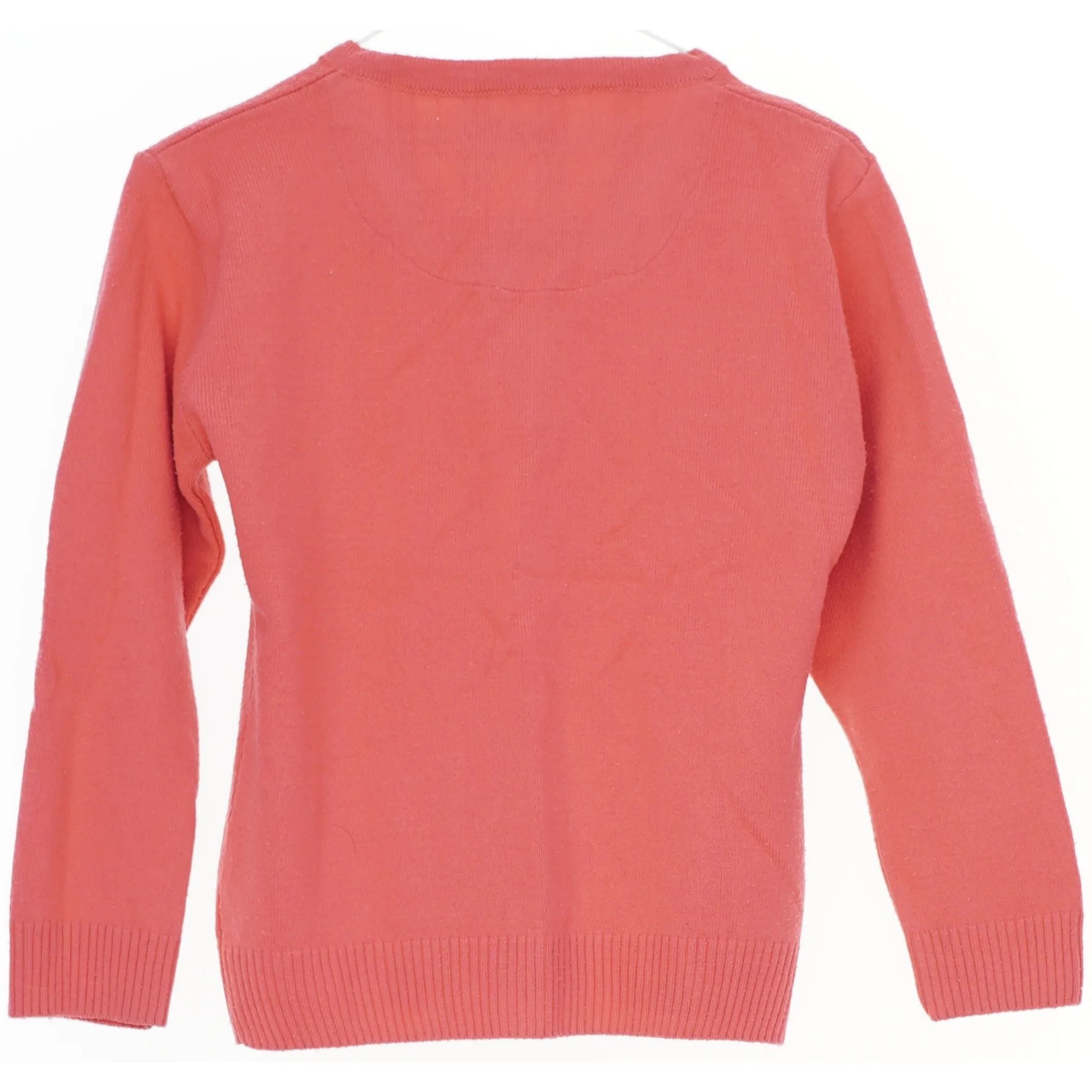 Cardigan i koral farve fra Burberry (str. 116)