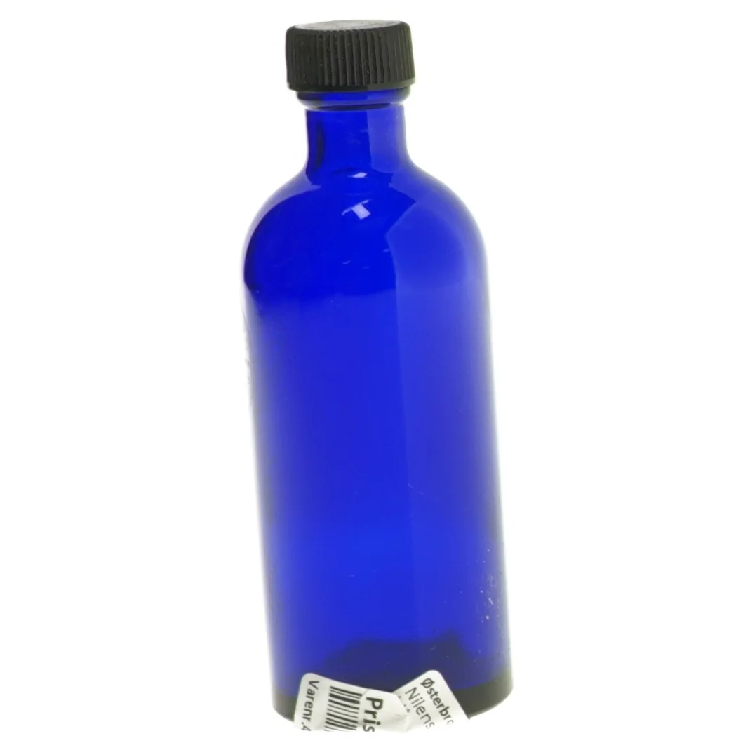 Nilens Jord Blå glasflaske med låg fra Neals Yard (str. 13 cm)
