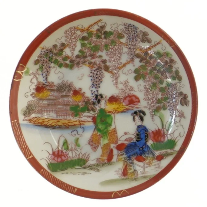 Sæt af dekorative tallerkener (str. Ø 13 cm)