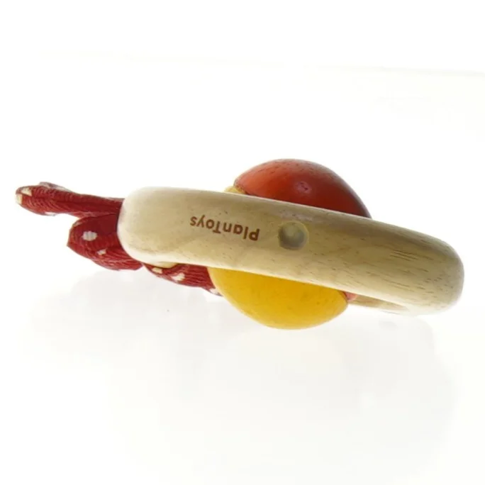 Trærasle med stofstjerne fra Plan Toys