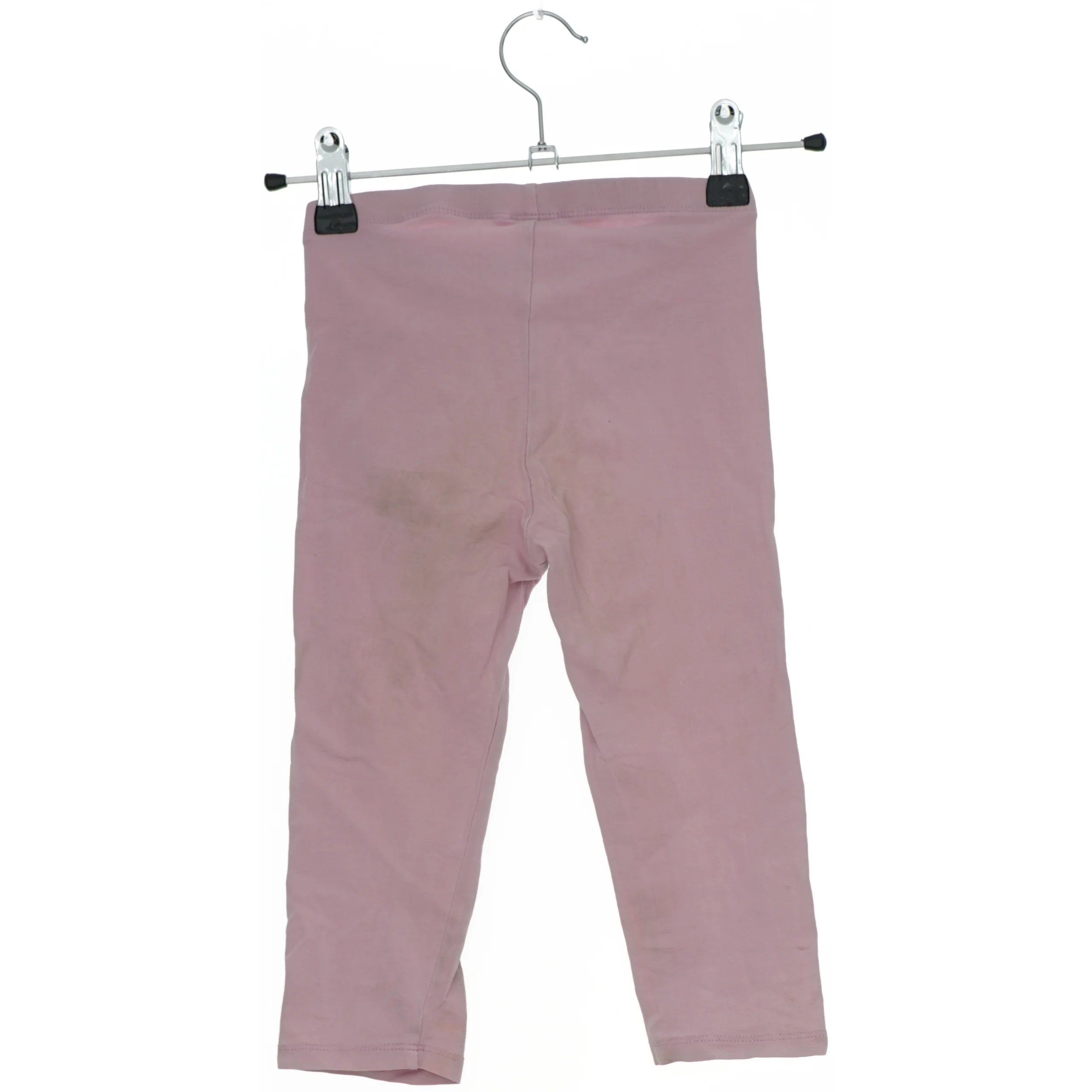 Lyserøde leggings fra H&M (str. 122)