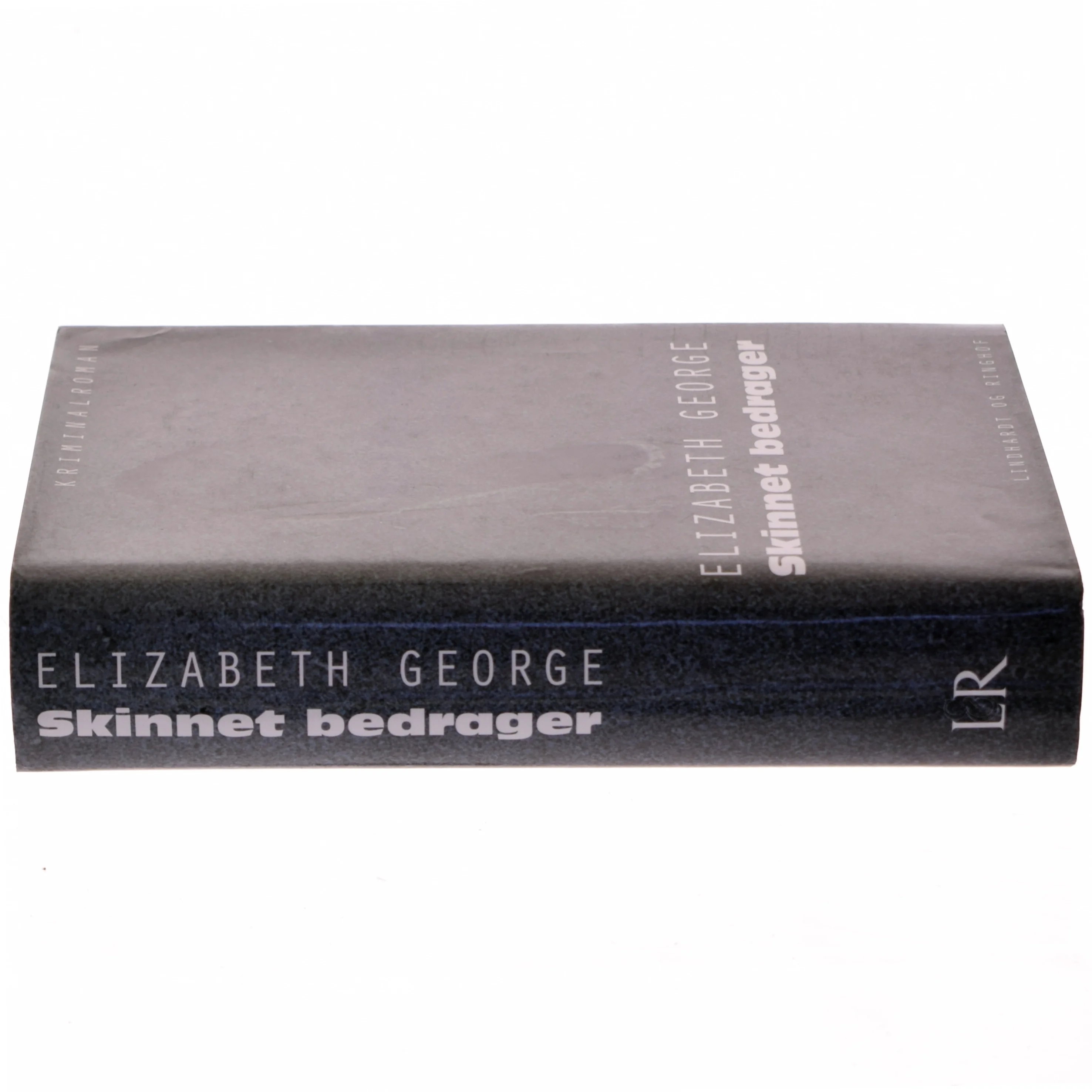 Skinnet bedrager af Elizabeth George (Bog)
