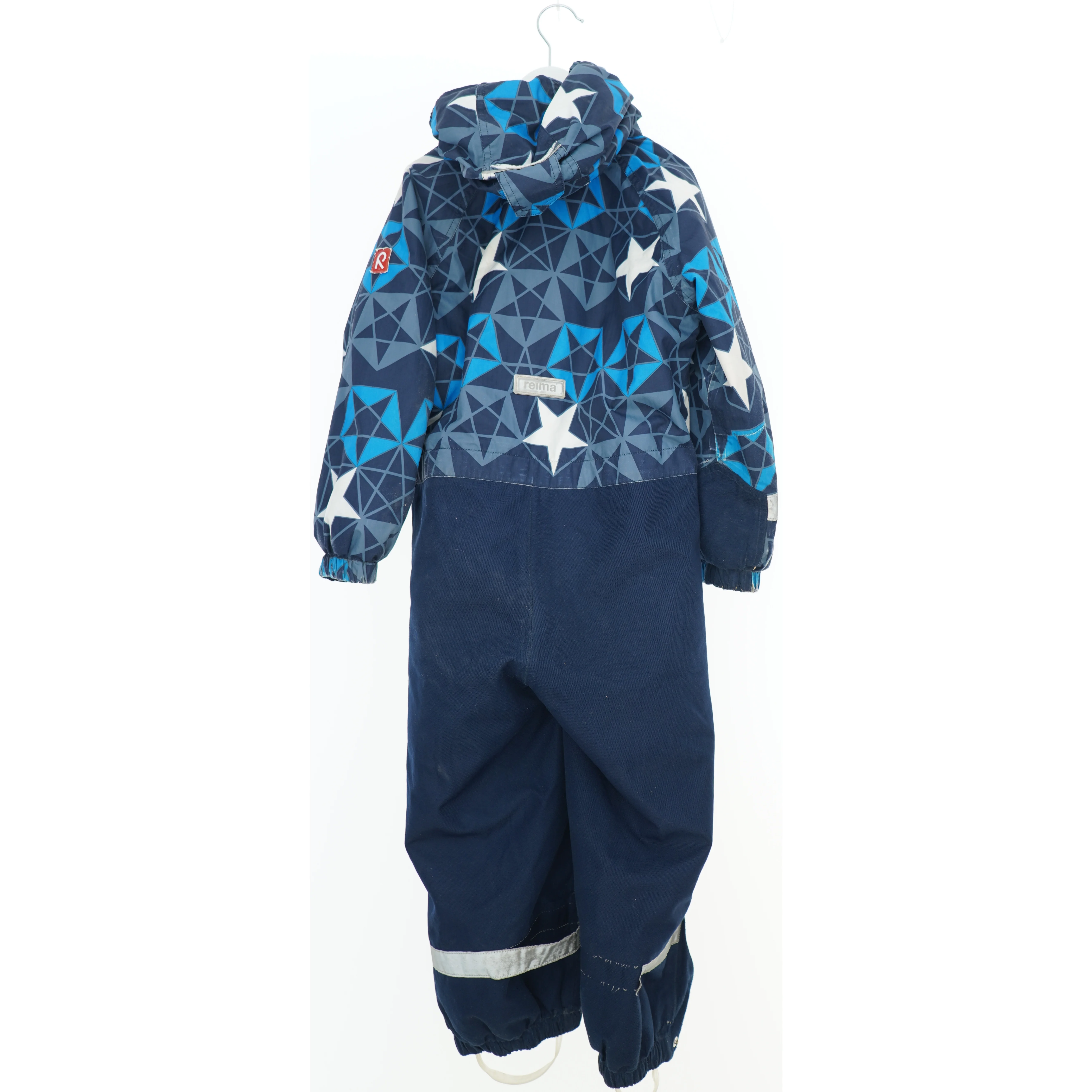 Blå flyverdragt med mønster fra Reima (str. 116)