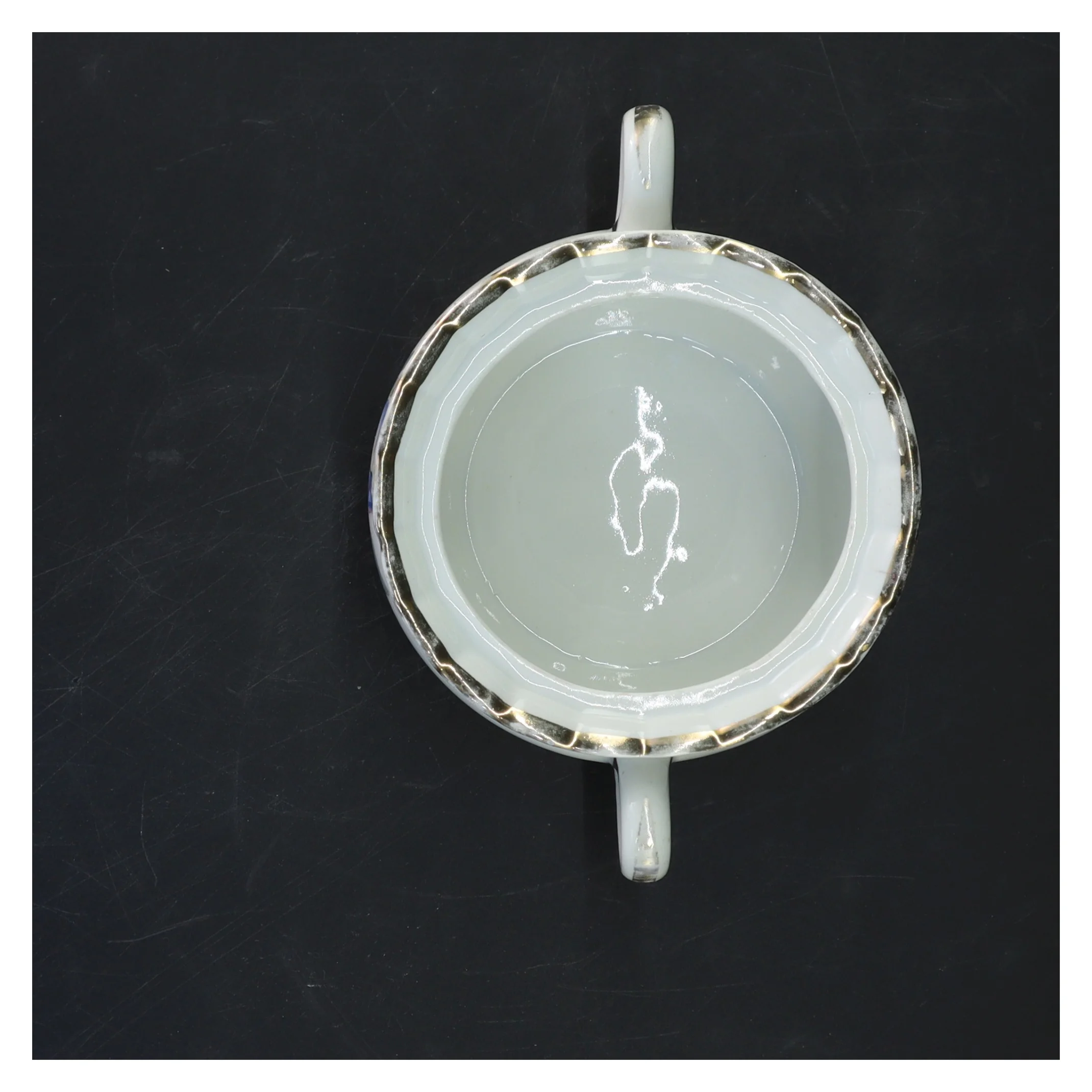 Porcelænsskål med håndtag og blomstermotiv fra B & G Decor (str. 16x7x11 cm)