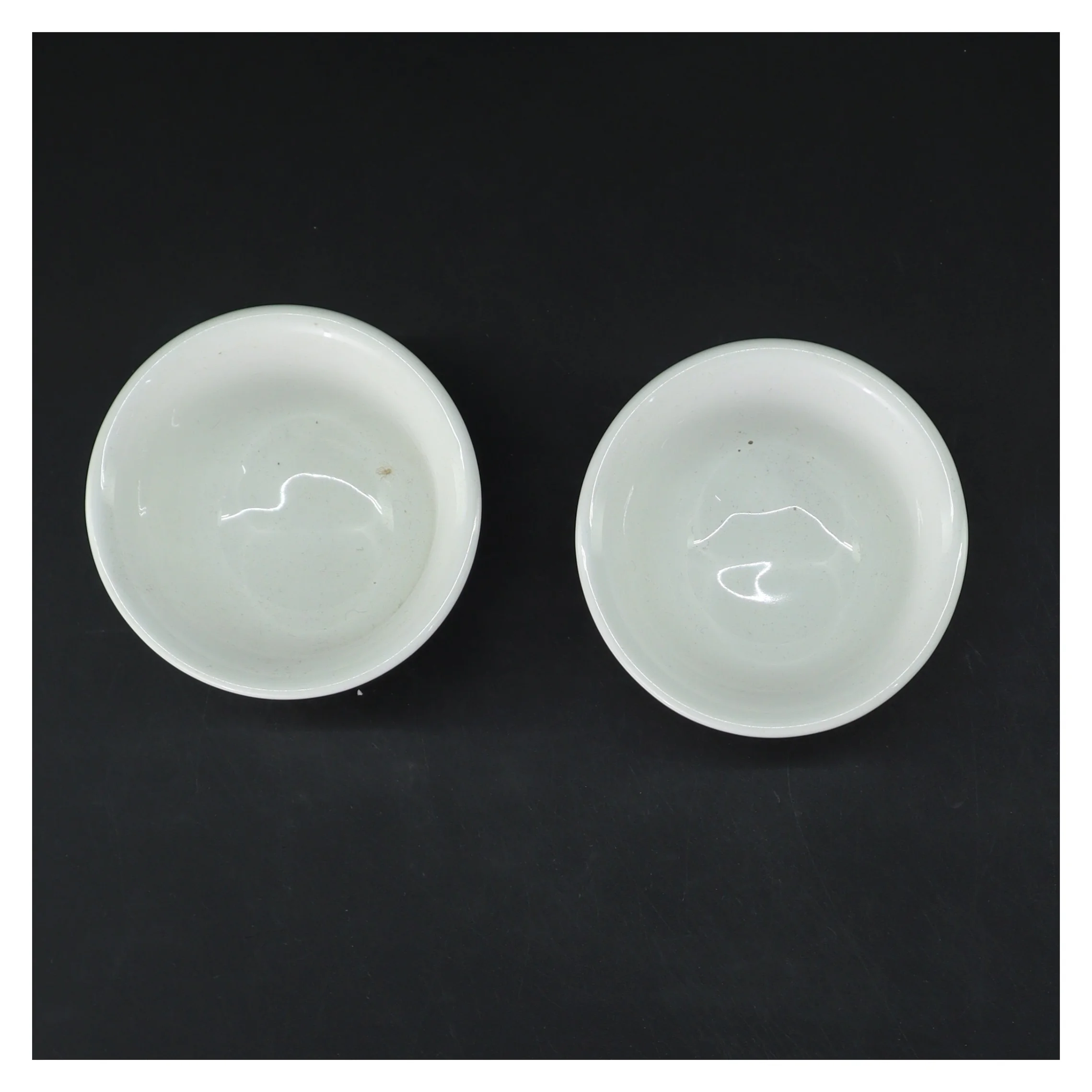 Porcelænskåle 2 stk (str. 2 stk Ø 8,5 cm længde 6,5 cm)