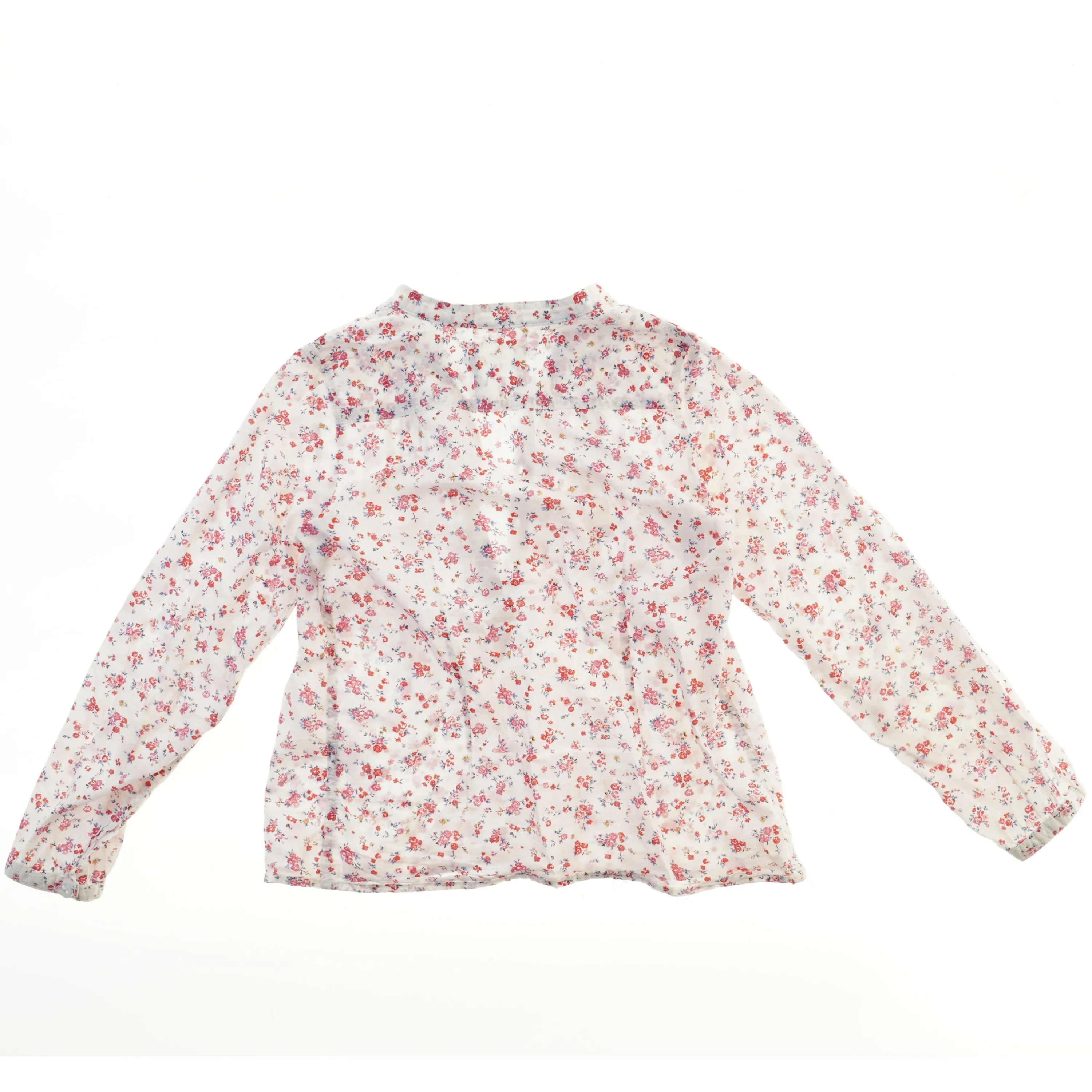 Bluse med blomsterprint fra H&M (str. 140)