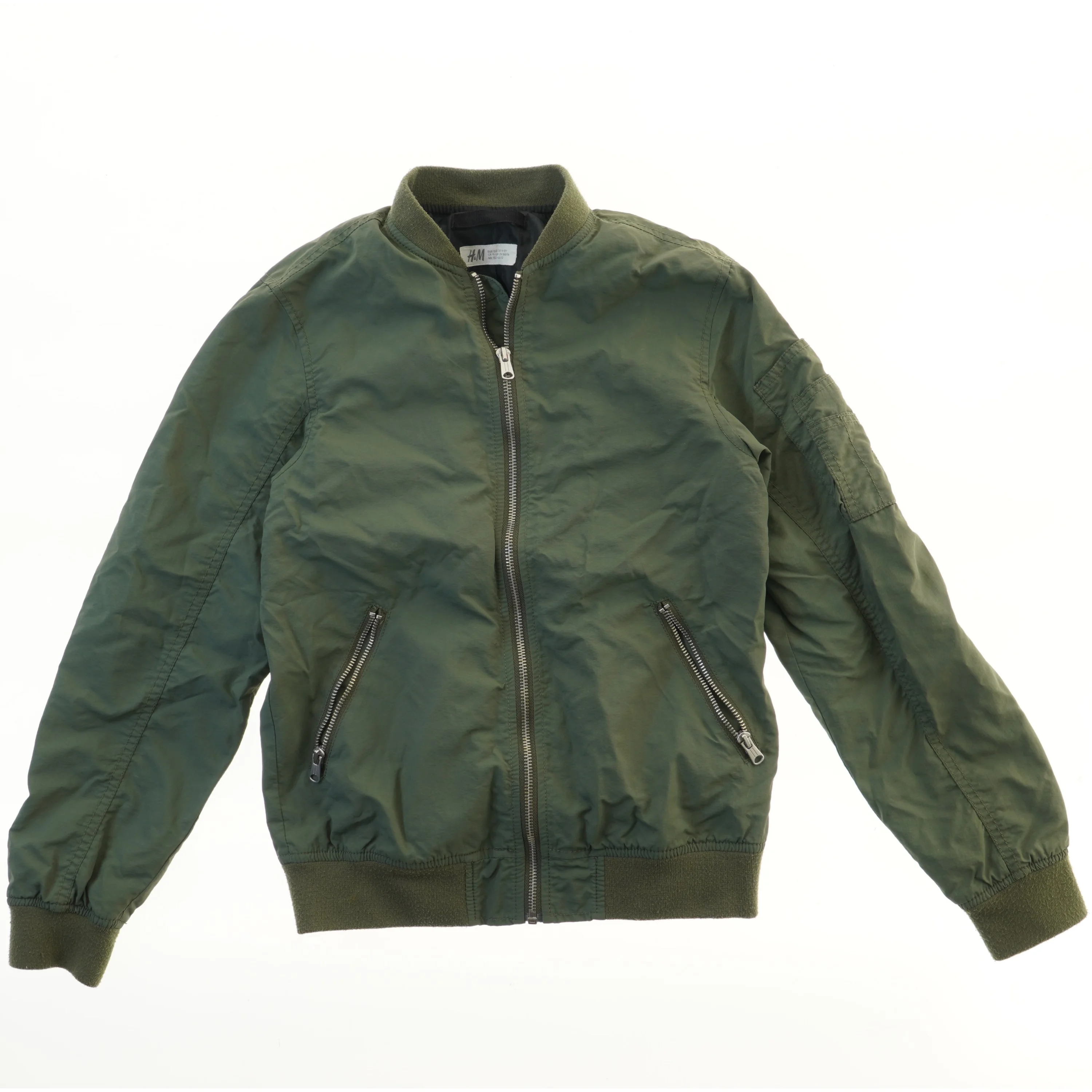 Grøn bomberjakke fra H&M (str. 152)