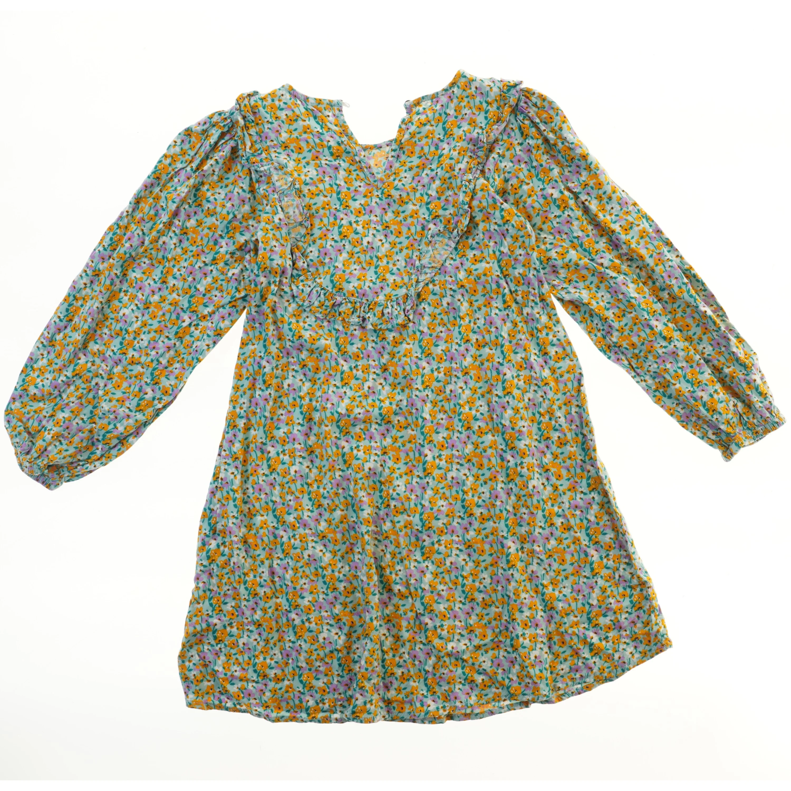 Blomstret kjole med lange ærmer fra Next (str. 140)