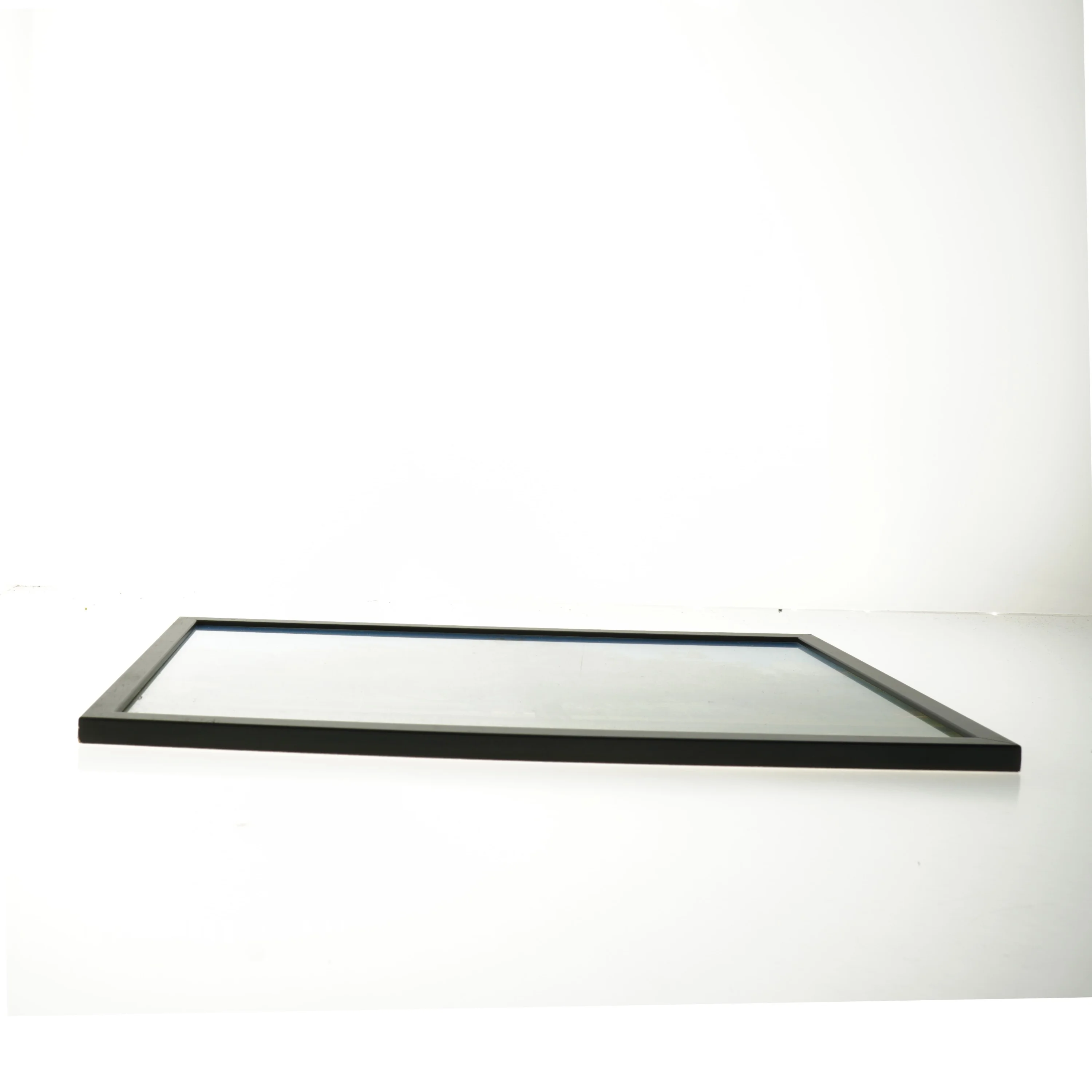 Indrammet landskabsbillede (str. 30x42 cm)