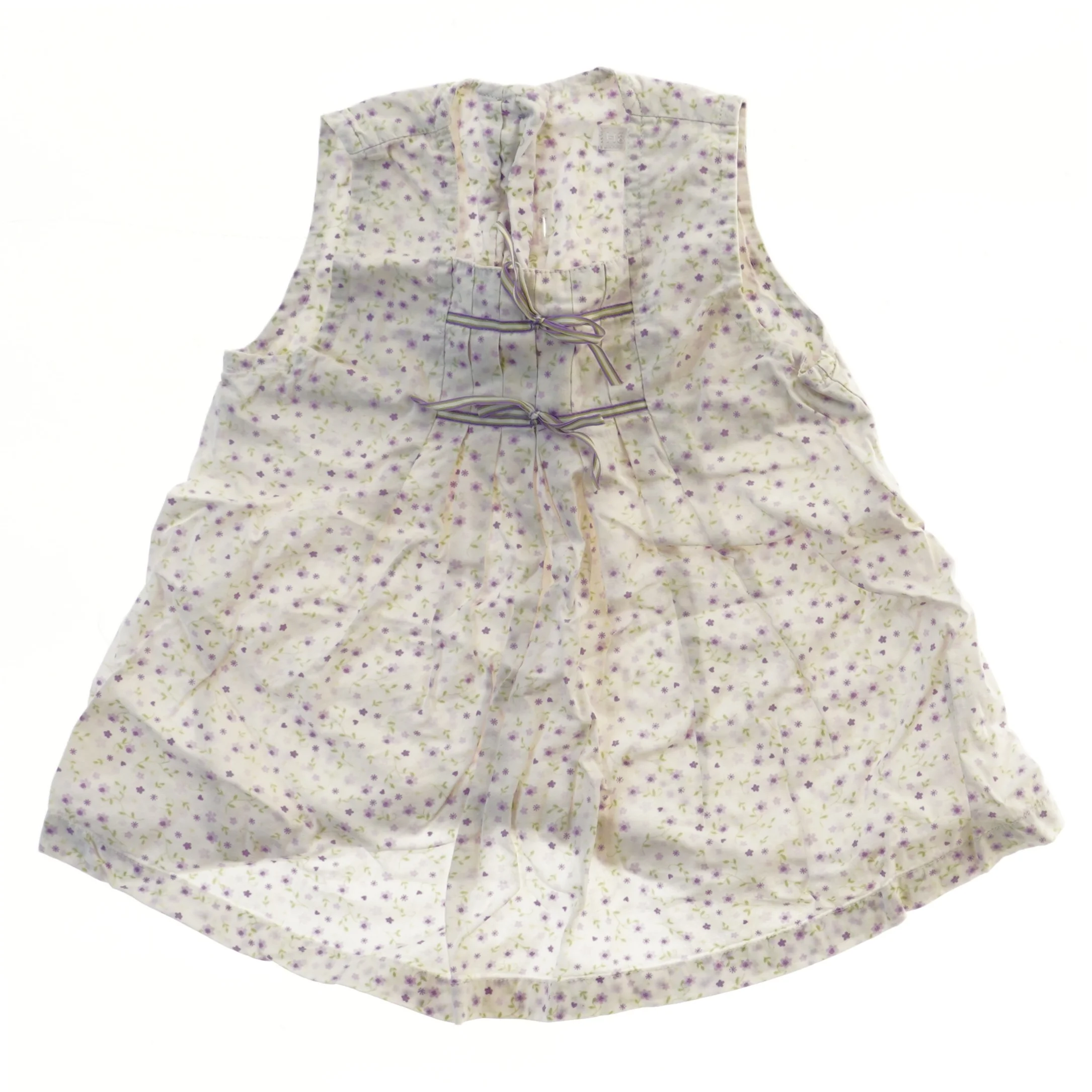 Bluse med blomsterprint fra H&M (str. 74)